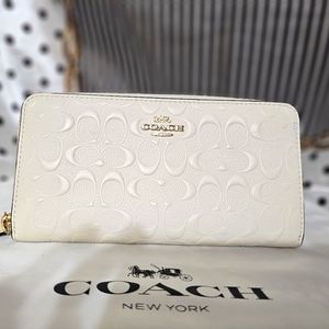 Coach ivory long zippy wallet